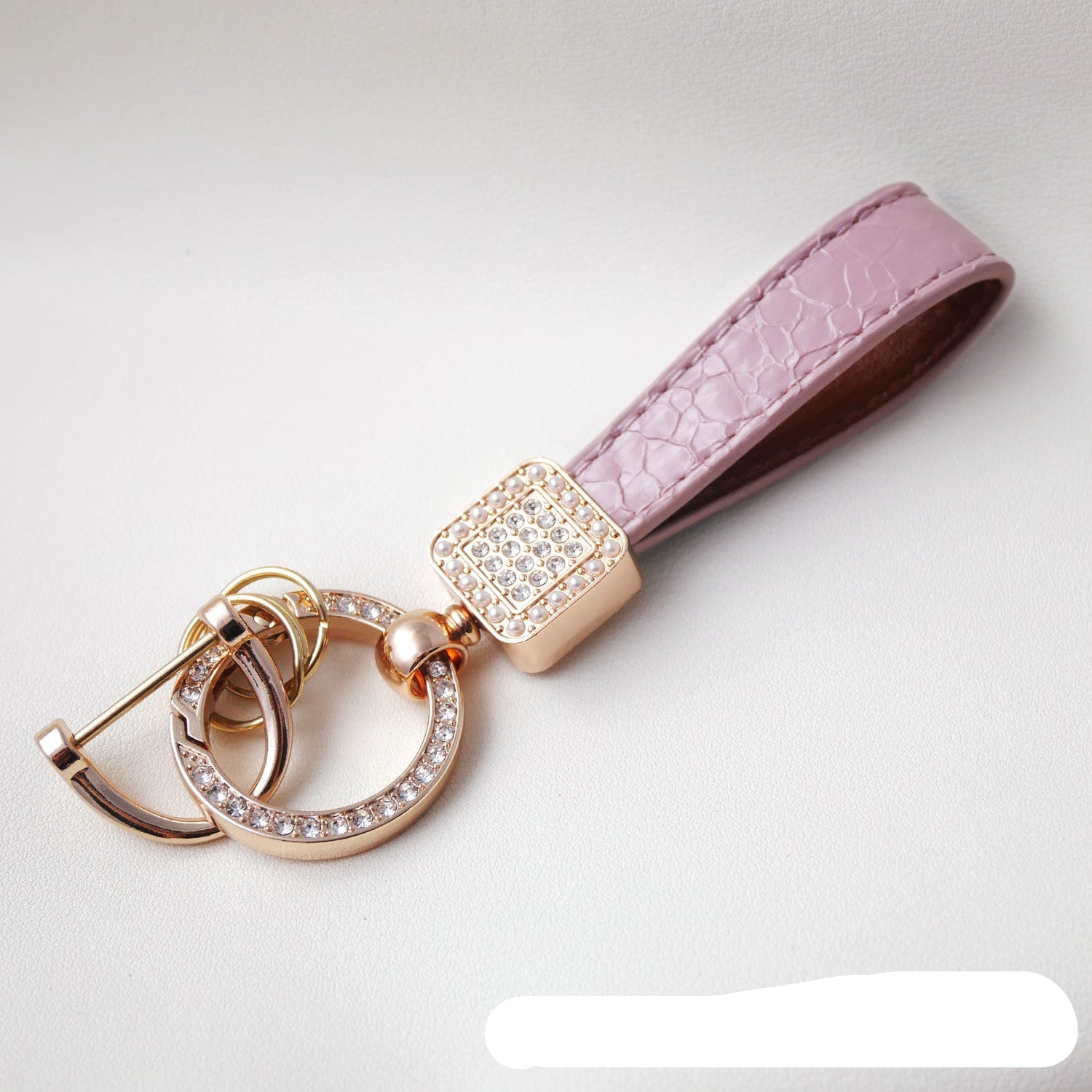 Wholesale Fashionable textured diamond spring ring keychain