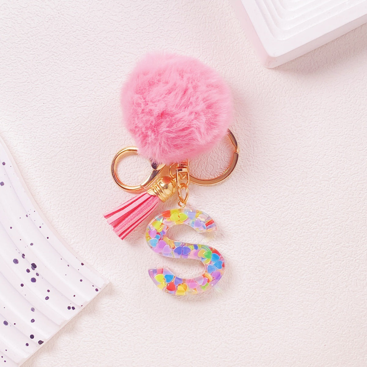Wholesale Hairball English 26 letter pink Pom Pom keychain