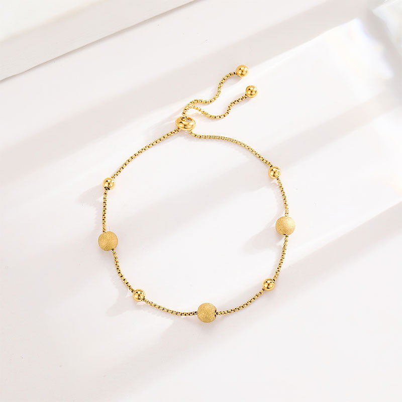 Wholesale Fashion Small Gold Bead Pull-out Titanium Steel Bracelet