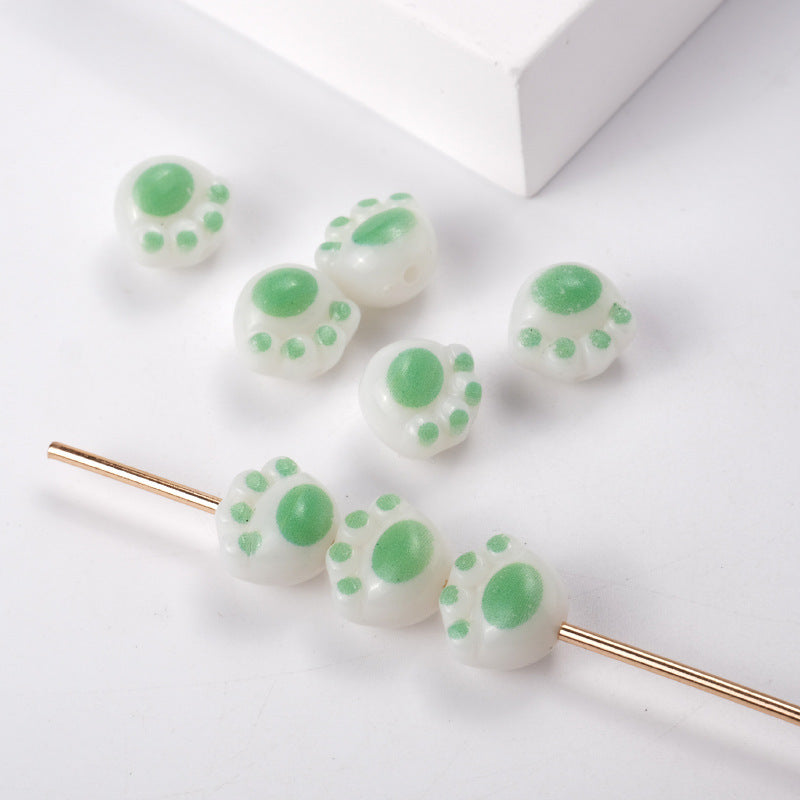 Wholesale 100PCS/PACK Cartoon Cute Three-dimensional Cat Claw Straight Hole Acrylic String Beads