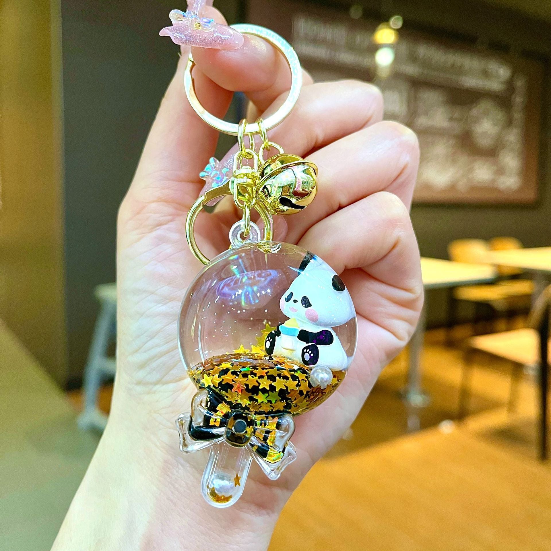 Wholesale Black gold floating cartoon cute panda Liquid Keychains