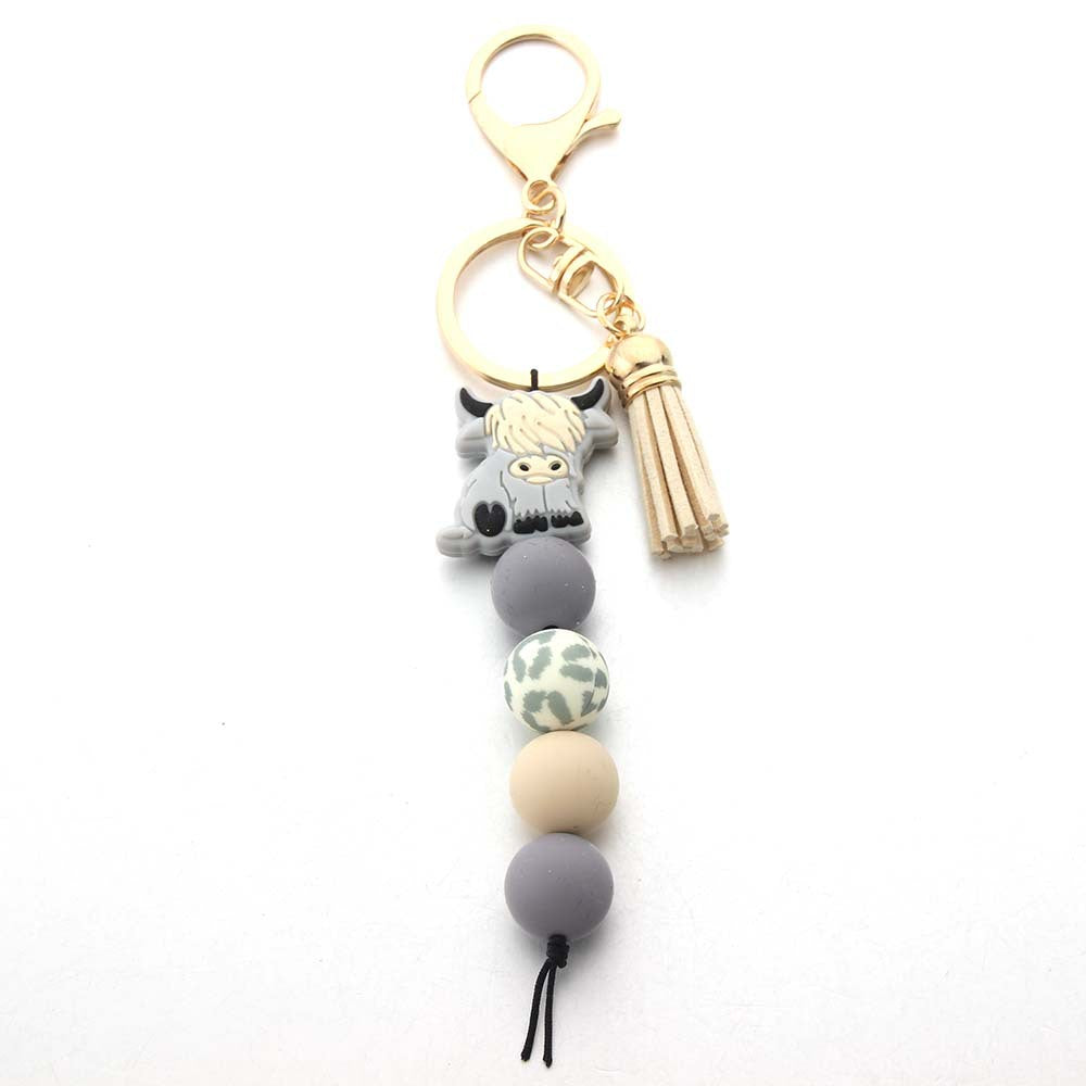 Wholesale Silicone Bead Cartoon Cow Keychain Bag Charm For Couple Birthday Gift And Everyday Use