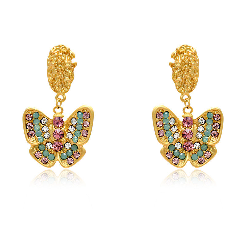 Pendientes de aleación de mariposa de damismo de oro tonto al por mayor