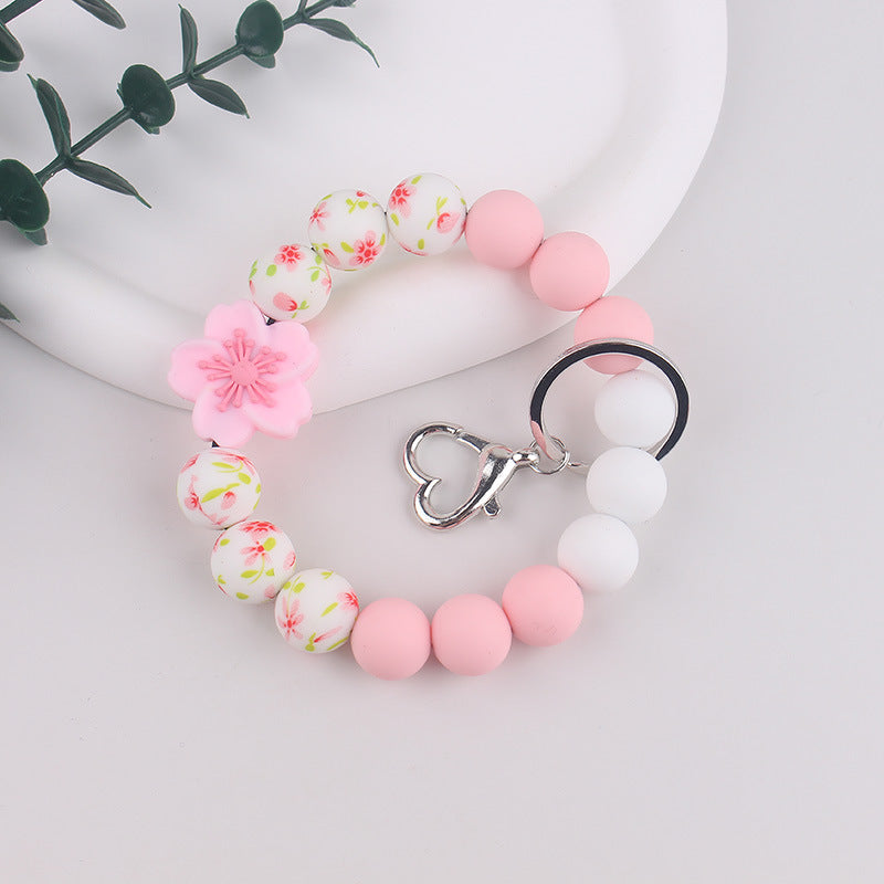 Wholesale Silicone bracelet Begonia keychain