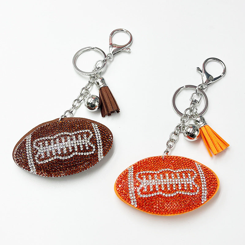 Wholesale Rhinestone rugby ball pendant with rhinestone tassels,  sporty bag accessory.