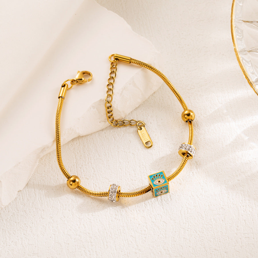 Wholesale Personalized Fashion Stainless Steel Bracelet with Diamond Creative Cube Devil Eye Pendant Titanium Steel Bracelet