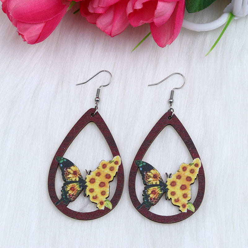 Lips al por mayor de los labios de la mariposa perezosa forma de caída de agua Pendientes de madera