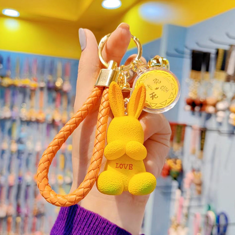 Caricatura de dibujos animados de dibujos animados de caricatura con llaves de conejo