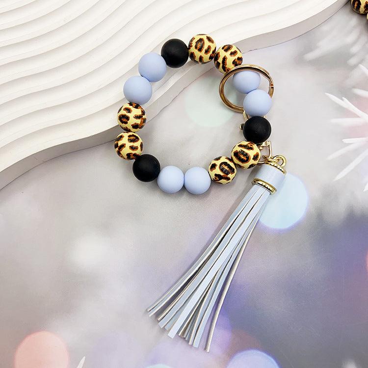 Wholesale Leopard Print Wood Beads Silicone Beaded Bracelet Tassel Key Ring