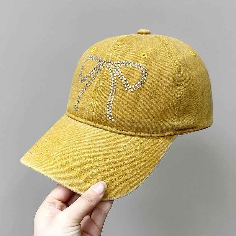 Wholesale Bow Rhinestone Soft Top Distressed Baseball Cap