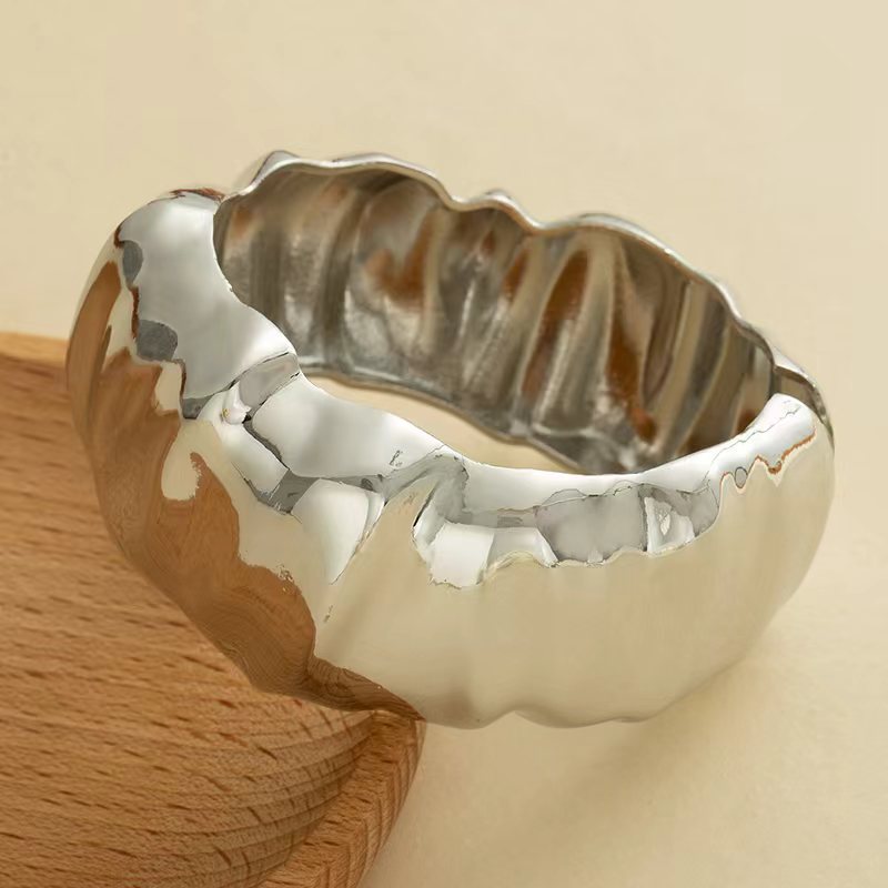 Wholesale Golden wide edged wave band exaggerated bracelet