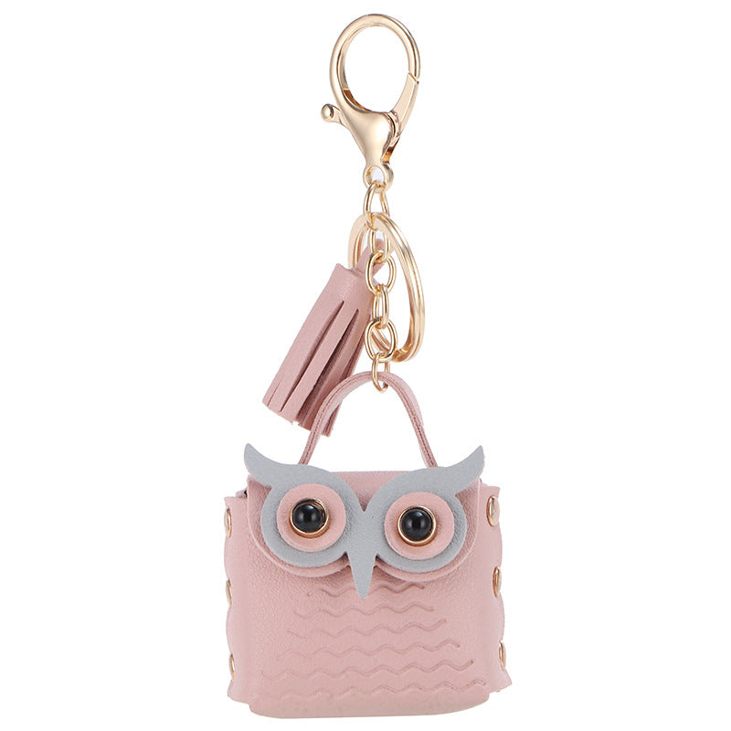 Wholesale Owl Bluetooth Headphones Artificial Leather Storage Bag Keychain