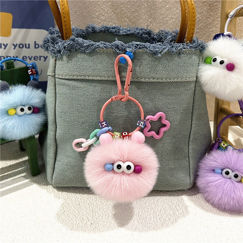 Wholesale Cute cartoon ugly creative small coal ball keychain