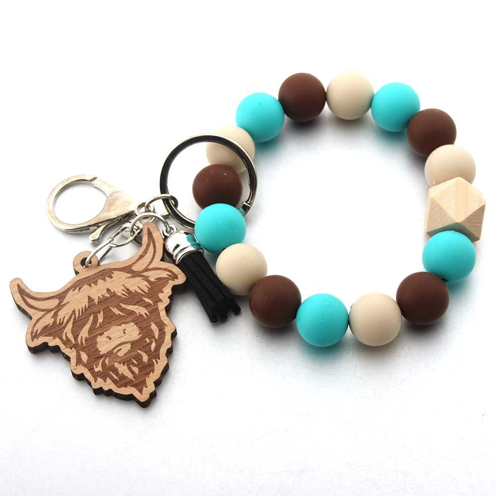 Wholesale Cartoon Western Cowboy Tassel Laser Bull Head Beaded Keychain