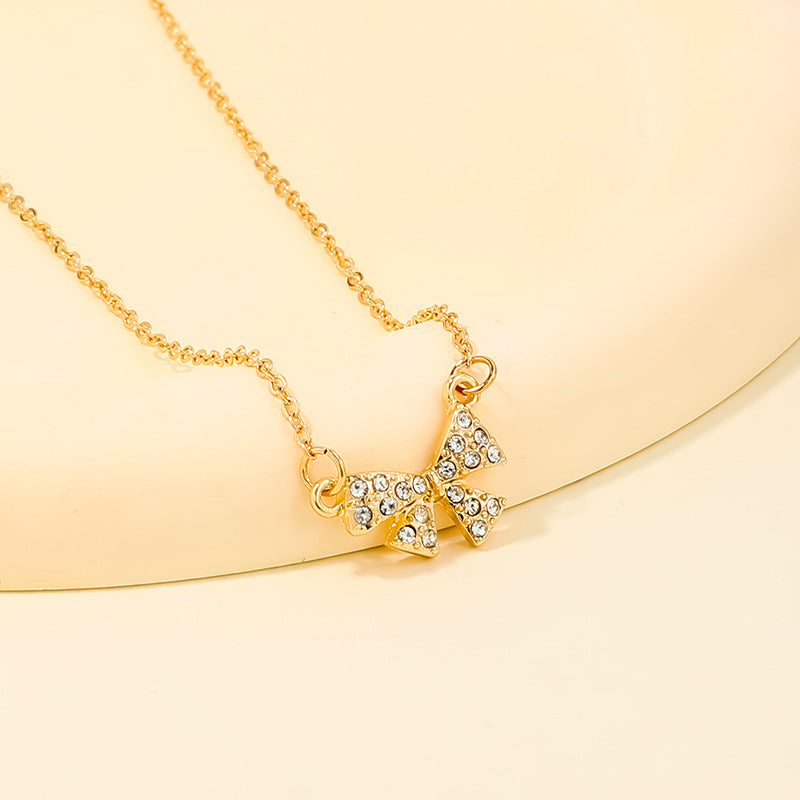Wholesale sweet metal diamond bow necklace