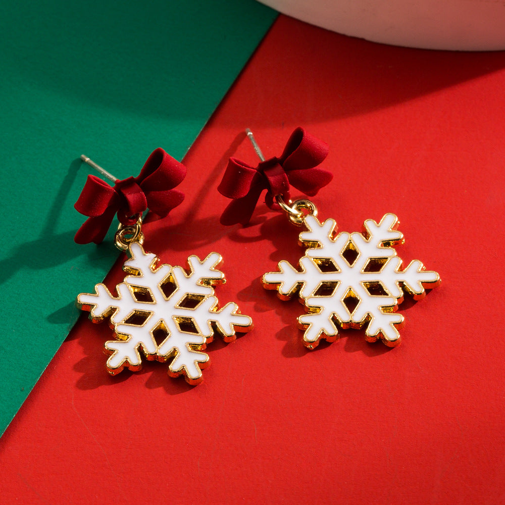 Wholesale The New Christmas Elements Are Fashionable and Versatile, and The Cut-out Snowflake Bow Dripping Oil Earrings