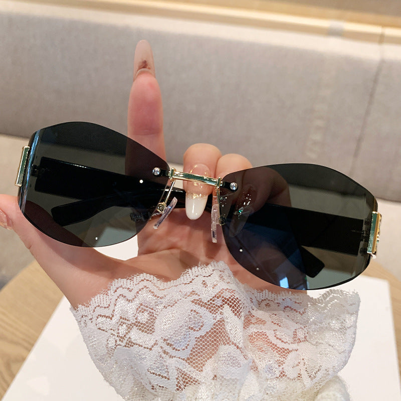 Wholesale Retro rimless oval curved lens sunglasses