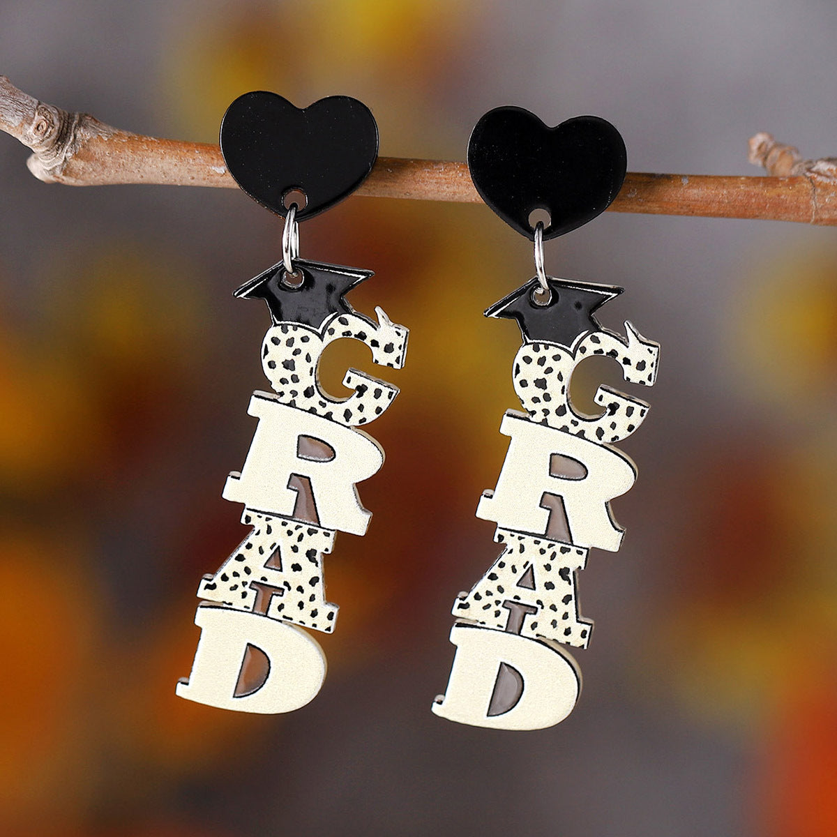 Acrylic pendant earrings for the graduation season of the school season