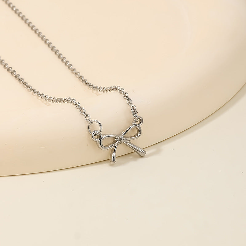 Wholesale sweet metal diamond bow necklace
