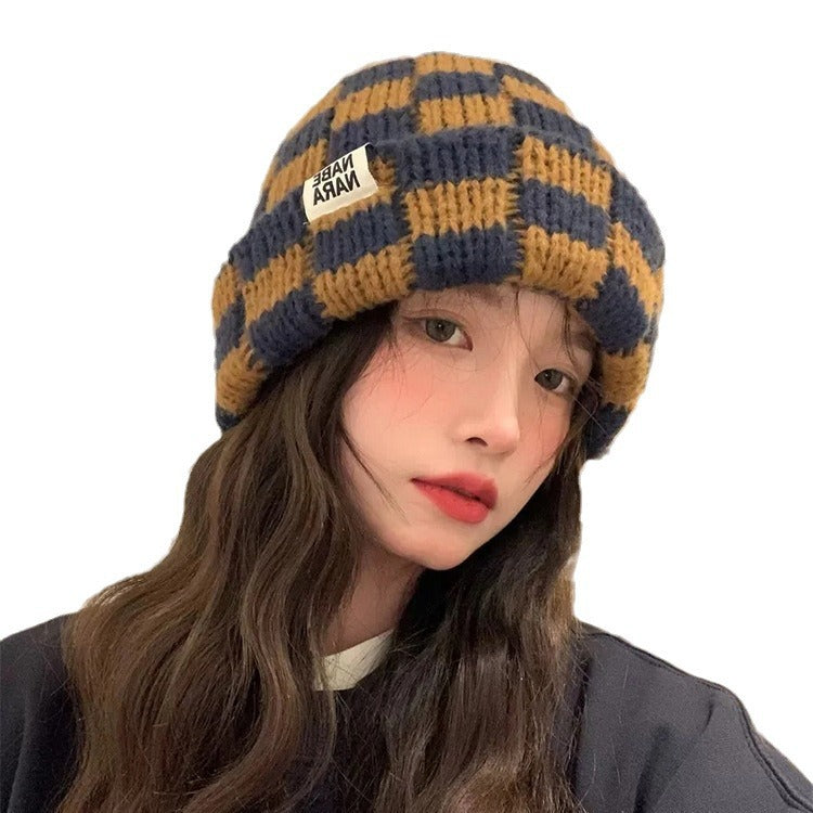 Wholesale Checkerboard plaid knitted hat women' s autumn and winter face-revealing small warm hat