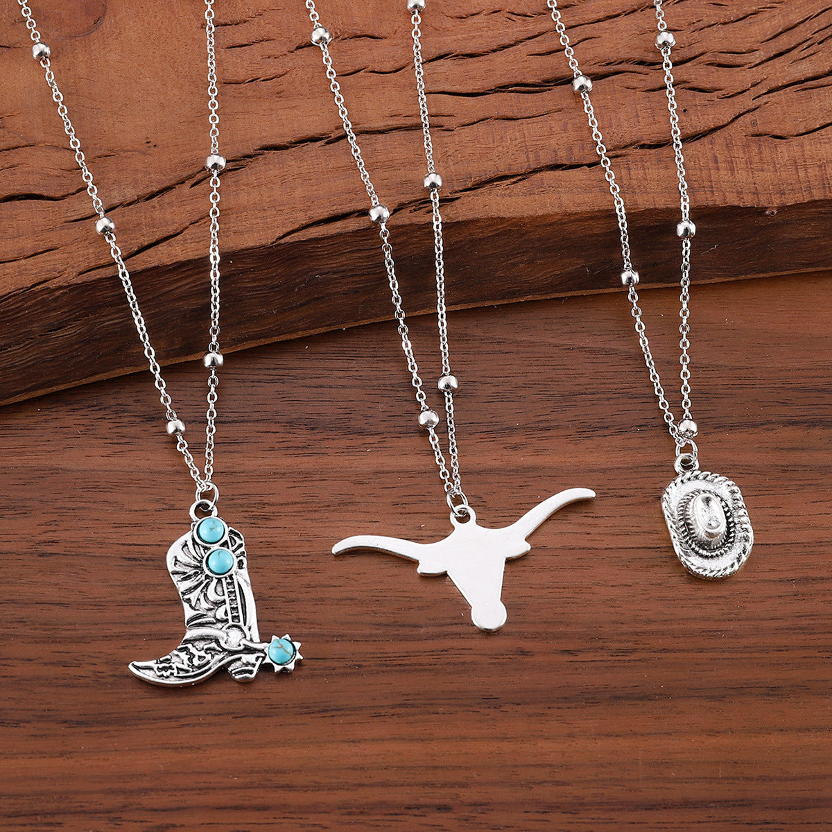 Wholesale Western Denim retro ethnic style imitation turquoise alloy cow's head war boots hat pendant necklace