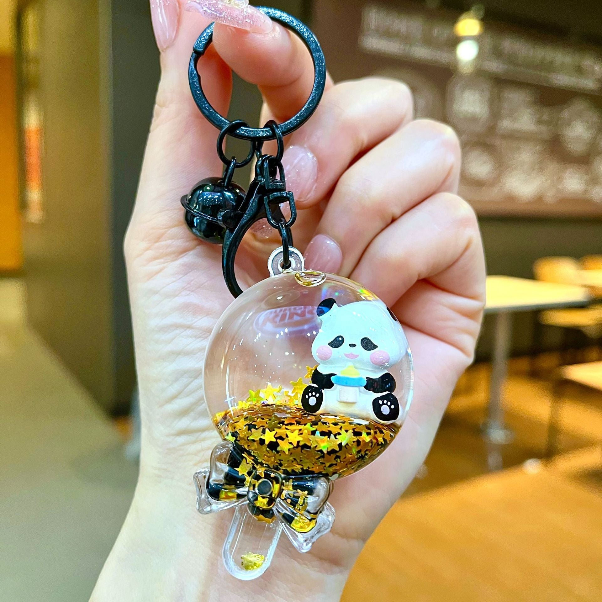 Wholesale Black gold floating cartoon cute panda Liquid Keychains