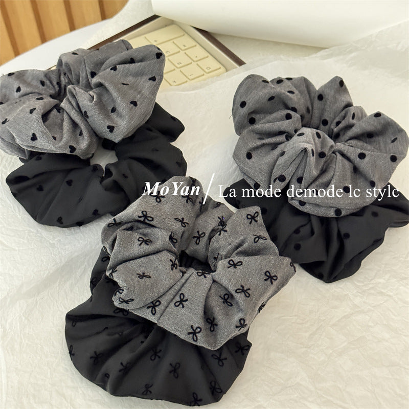 Wholesale Black polka dot bow with heart-shaped elastic headband