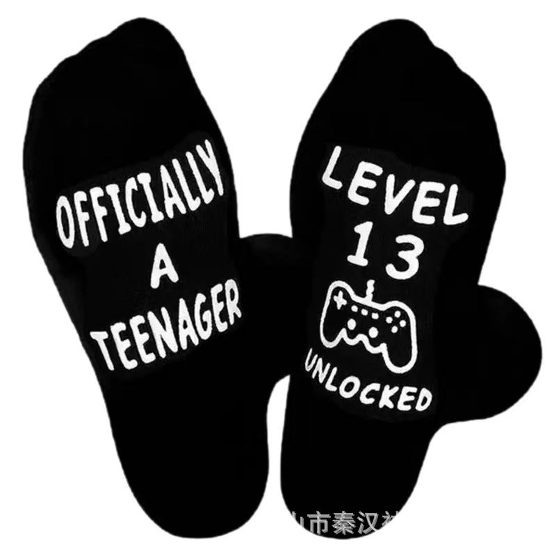 Wholesale of European and American Cotton Medium Cylinder Letter Anti Slip Adhesive Socks