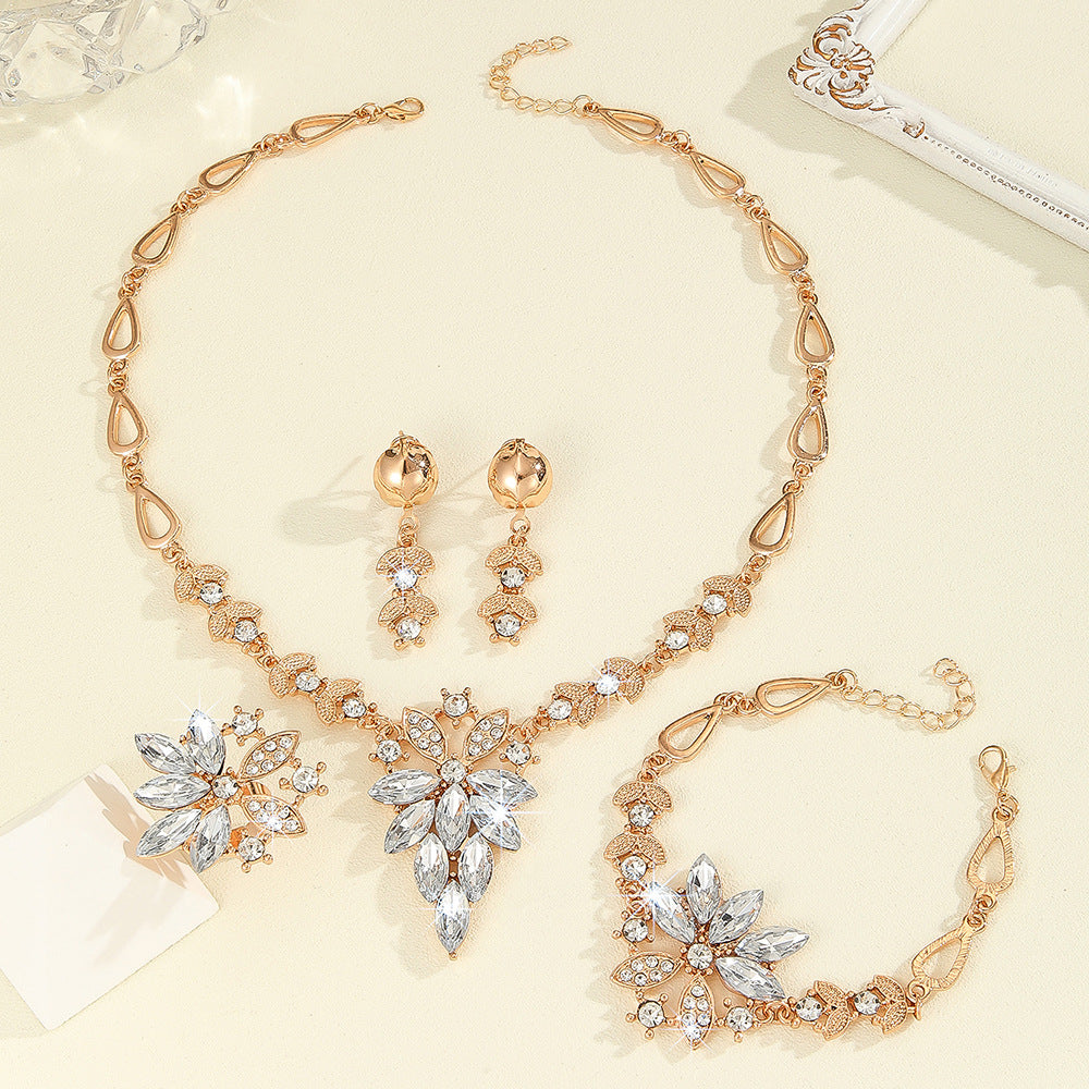 Wholesale Fashionable and Exaggerated Diamond-Encrusted White Marquise Necklace  Earrings Ring  and Bracelet Four-Piece Jewelry Set