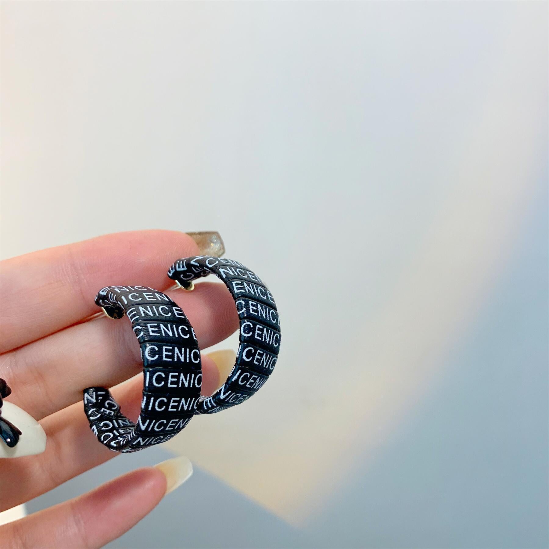 Wholesale S925 Silver Needle Versatile Letter Stripe Cold Wind Leather Earrings