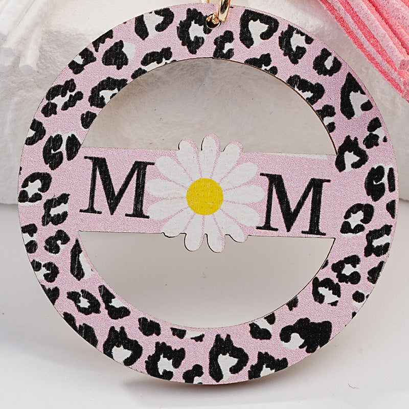 Wholesale Mother's Day Hollowed Out Pink Circular Daisies in English Metal Keychain