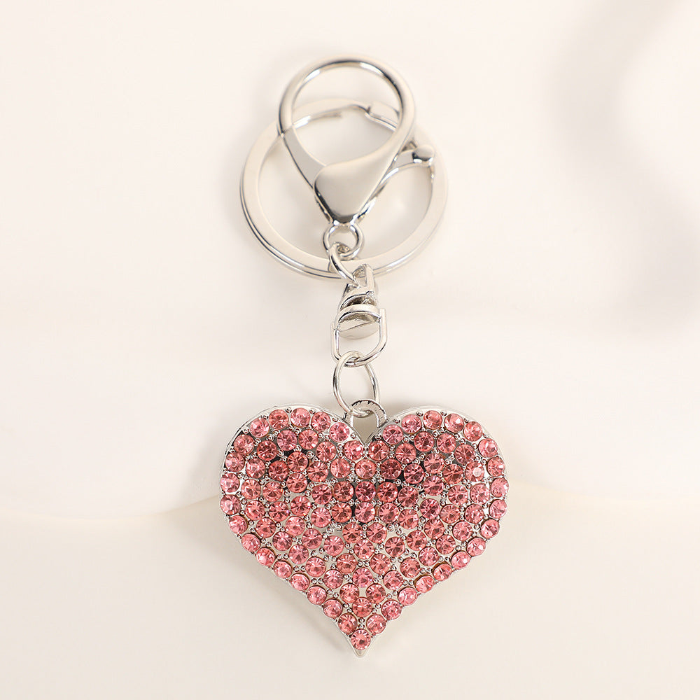 Wholesale Solid color peach heart set with diamonds Metal Keychain