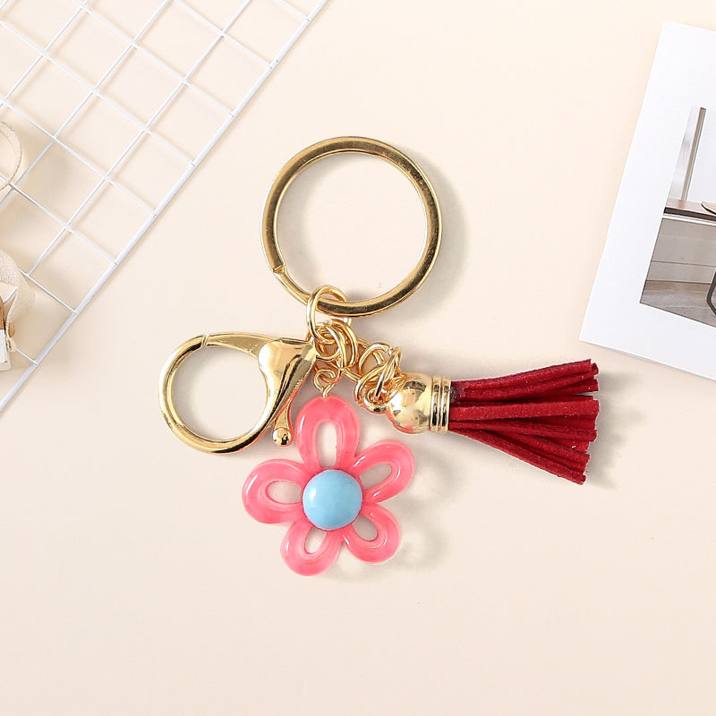 Wholesale Cute hollow sunflower tassel keychain