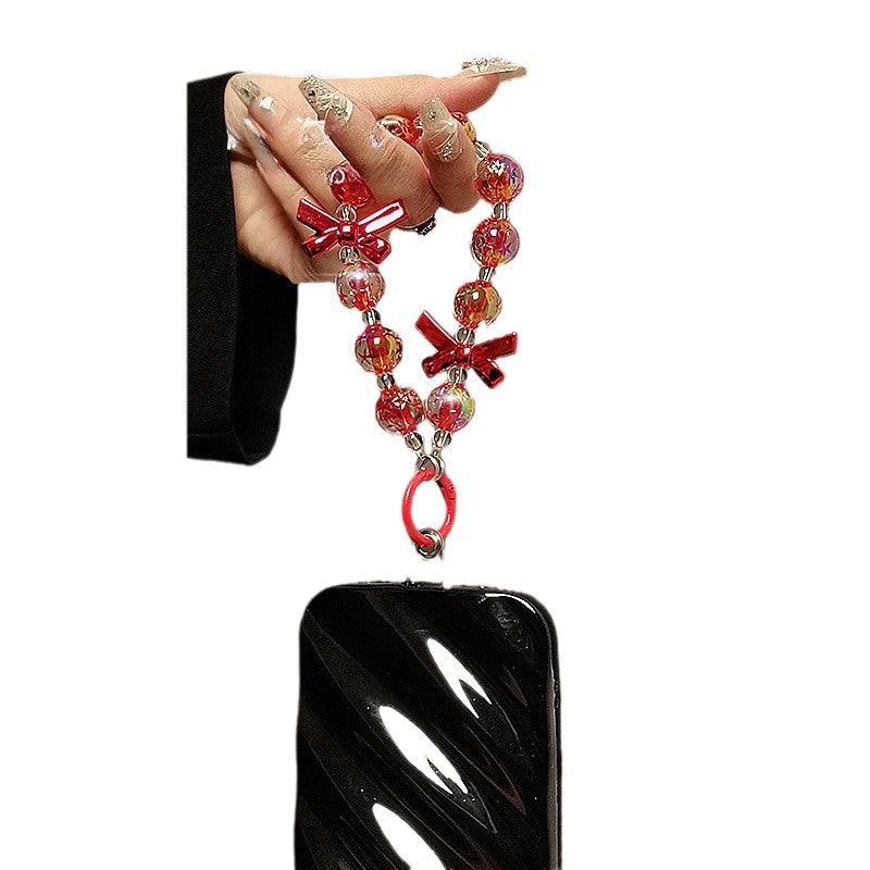 Wholesale Handmade beaded personality fashion bow short wrist hand chain mobile phone lanyard mobile phone case pendant