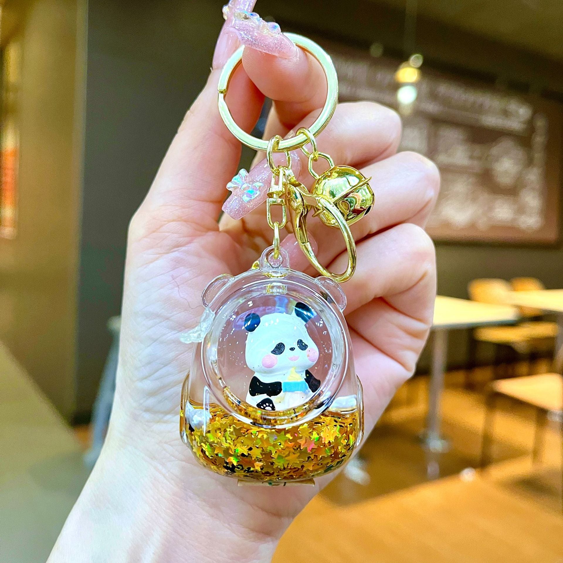 Wholesale Black gold floating cartoon cute panda Liquid Keychains
