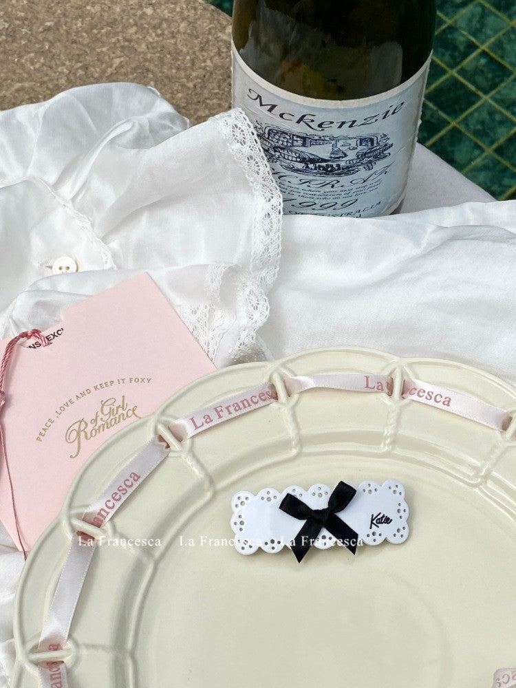 Wholesale Sweet and Cool Bow Hollow Letter Clip