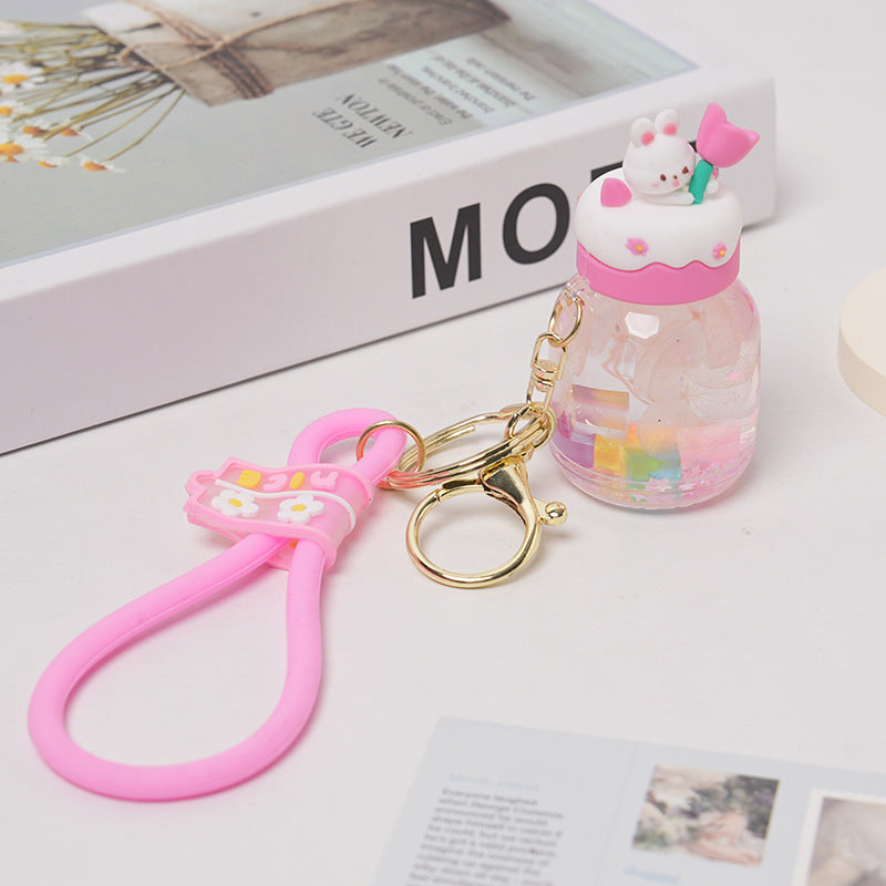 Botella flotante de dibujos animados acrílicos al por mayor en aceite Liquid Liquid Rabbit Keychain