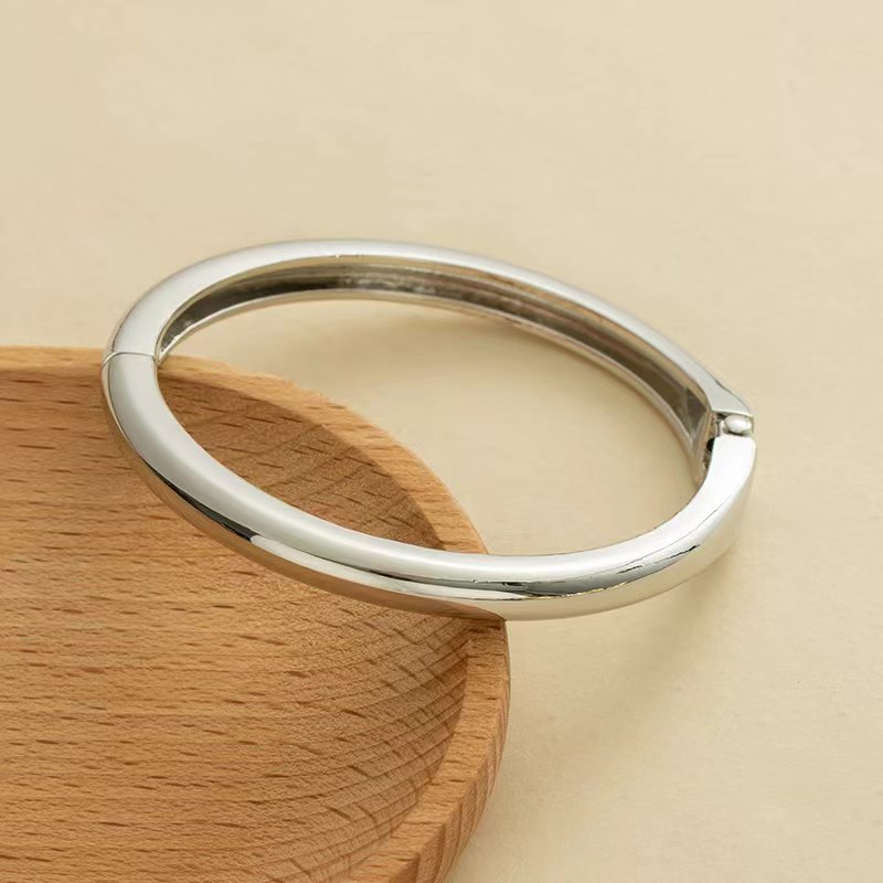 Wholesale Golden wide edged wave band exaggerated bracelet