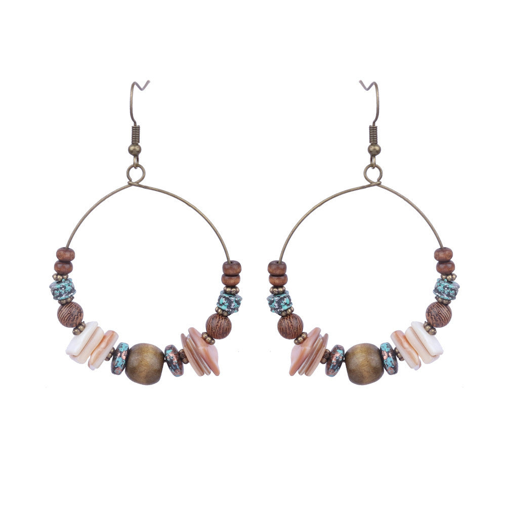 Wholesale Bohemian Rice Pearl Shell Long Tassel Earrings