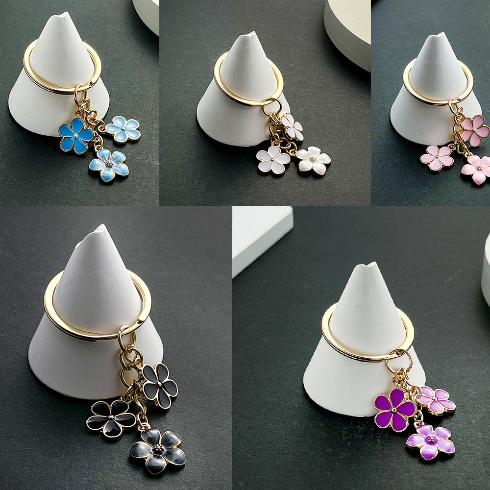 Wholesale black/ white/ blue/ pink/ purple multicolor optional luggage jewelry keychain