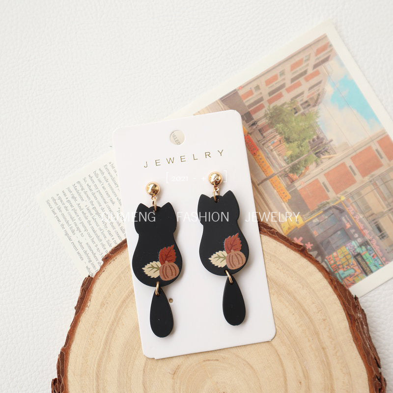 Wholesale Imitation Soft Pottery Hand Feel Spray Painted Acrylic Cat Maple Leaf Earrings