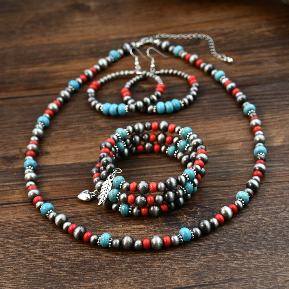 Wholesale Retro Bohemian red turquoise beaded jewelry ethnic style ancient tin necklace earrings bracelet three-piece set