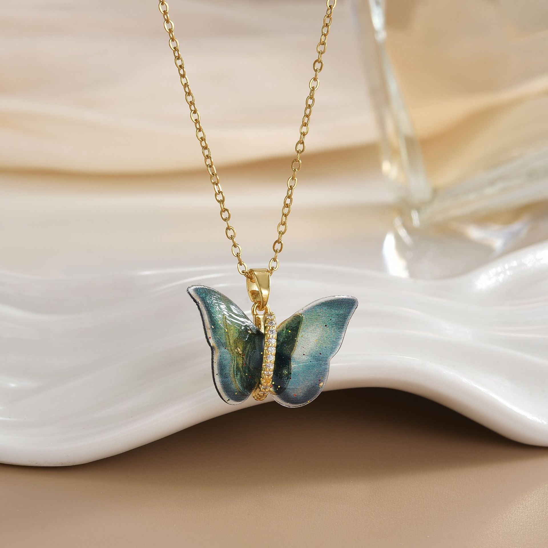 Wholesale Colored resin butterfly titanium steel locking chain