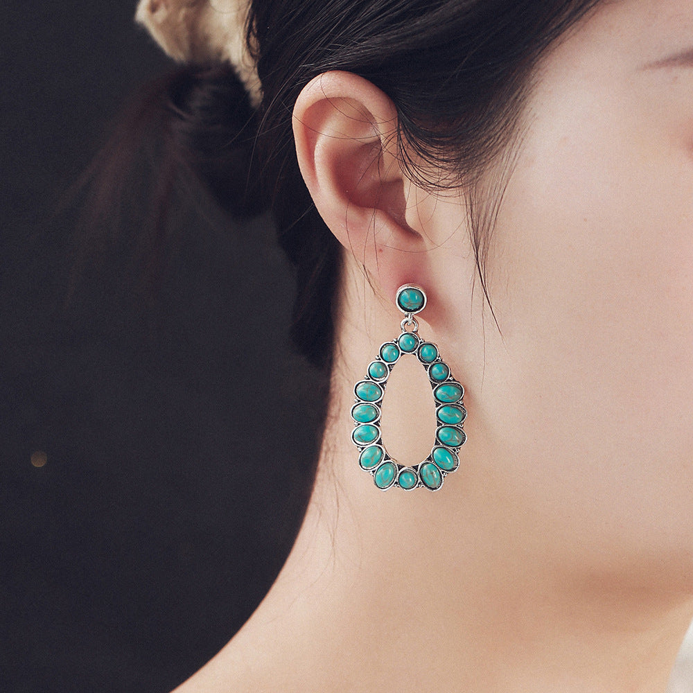 Wholesale Exaggerated retro oval turquoise teardrop-shaped hollow earrings