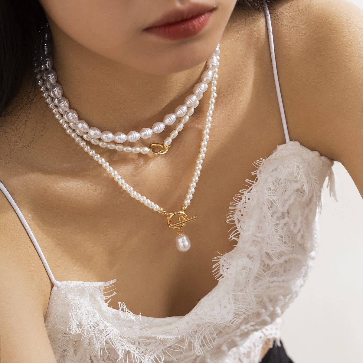 Wholesale of Multi-layer Rice Shaped Pearl Necklaces