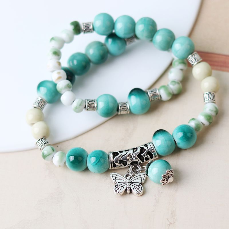 Aleación al por mayor nueva pulsera de cerámica de doble anillo de estilo chino