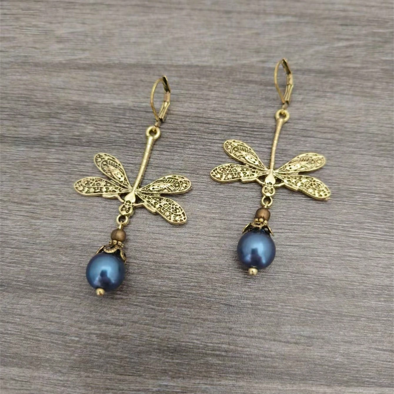 Wholesale Retro Dragonfly Inlaid Pearl Pendant Alloy Earrings Bohemian