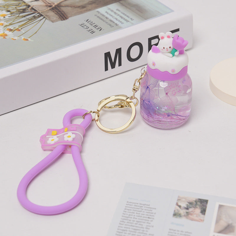 Botella flotante de dibujos animados acrílicos al por mayor en aceite Liquid Liquid Rabbit Keychain