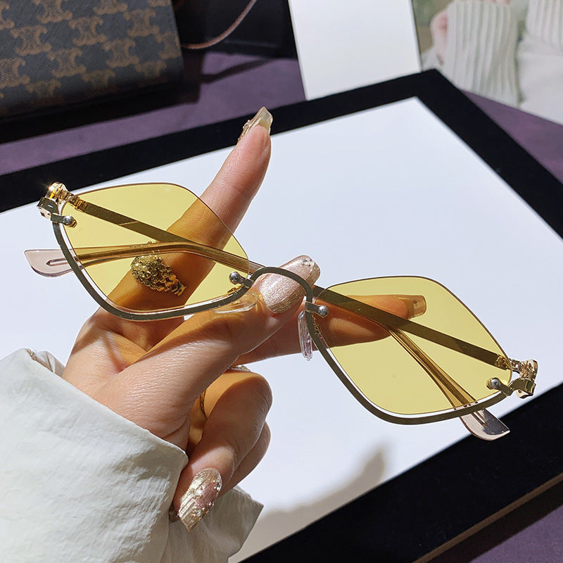 Wholesale Fashion half frame diamond sunglasses metal high-end sense 2025 new small frame modern trend catwalk European and American sunglasses