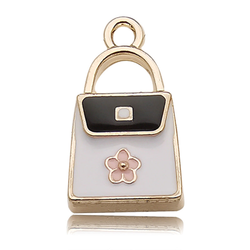 Wholesale Personalized Alloy Oil Dripping Pearl Eye Shadow Flower Perfume Bottle Diy Necklace Pendant Accessories